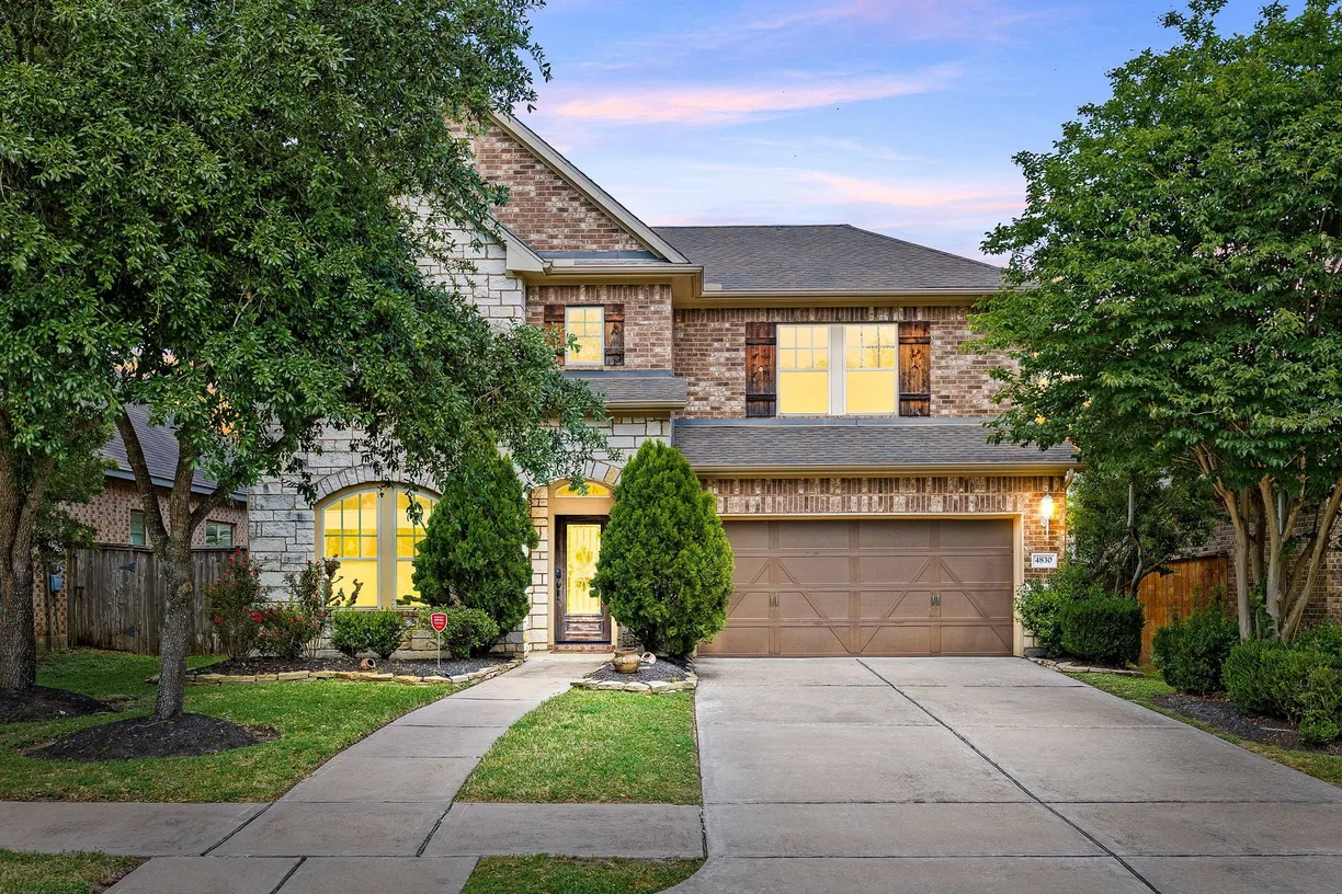 Houston Suburbs Real Estate | View 4830 Ashley Hope Drive | 4 Beds, 3 Baths
