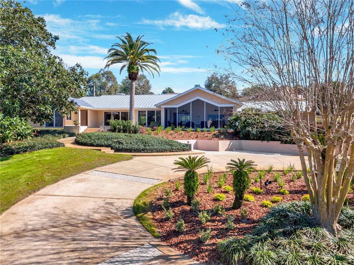 Central Florida Real Estate | View 12104 Lakeshore Drive | 4 Beds, 3 Baths
