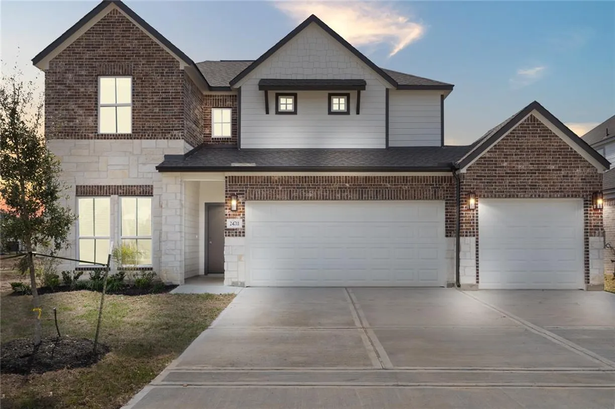 Houston Suburbs Real Estate | View 24711 Forest Hazel Drive | 4 Beds, 3 Baths