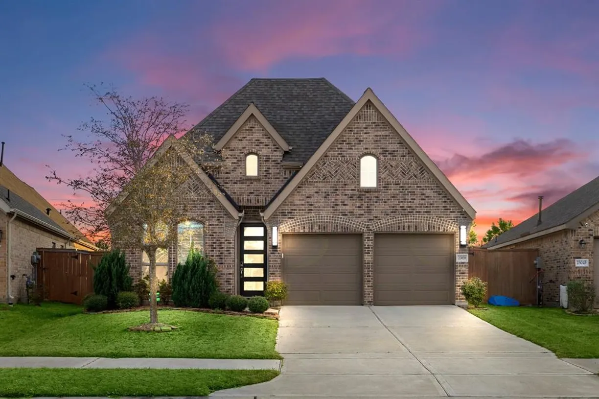 Houston Suburbs Real Estate | View 23039 Birchwood Valley Lane | 4 Beds, 3 Baths