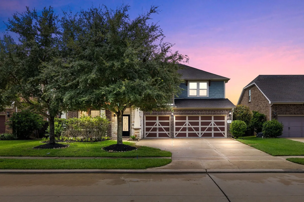 Houston Suburbs Real Estate | View 3306 Belmont River Lane | 5 Beds, 3 Baths
