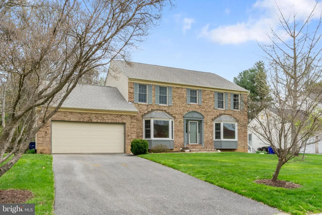 Washington Metro Area Real Estate | View 10216 Clubhouse Ct | 4 Beds, 2 Baths