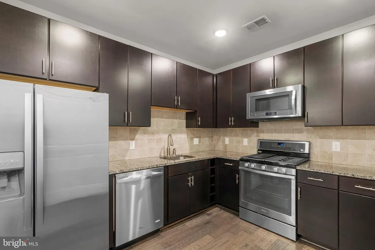 Washington Metro Area Real Estate | View 9521 Bastille St, 303 | 2 Beds