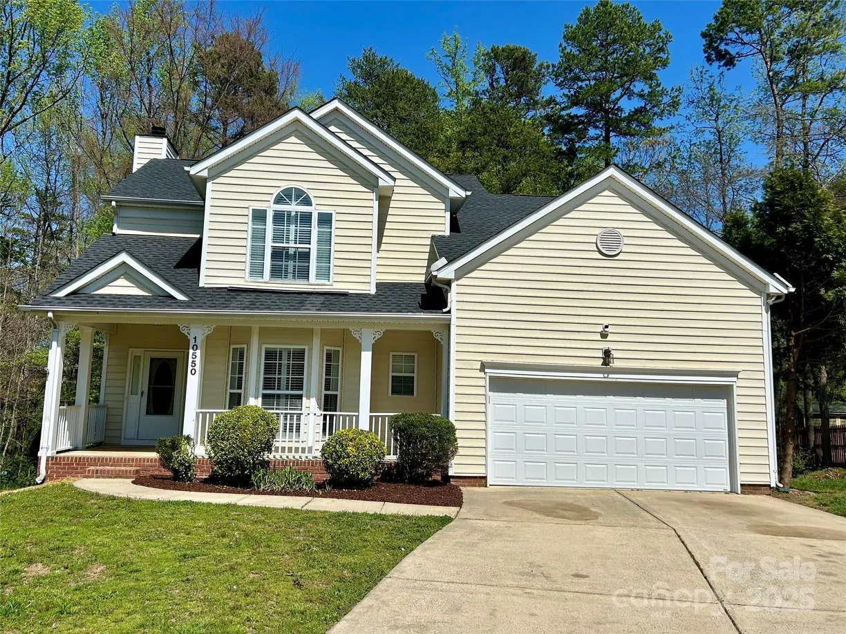 Charlotte Real Estate | View 10550 Worsley Lane | 4 Beds, 2 Baths