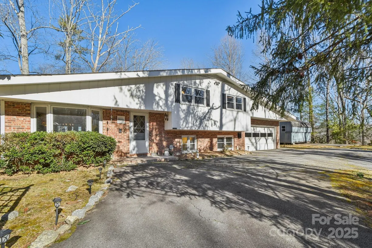 Charlotte Real Estate | View 76 Royal Knoll Drive | 4 Beds, 2 Baths