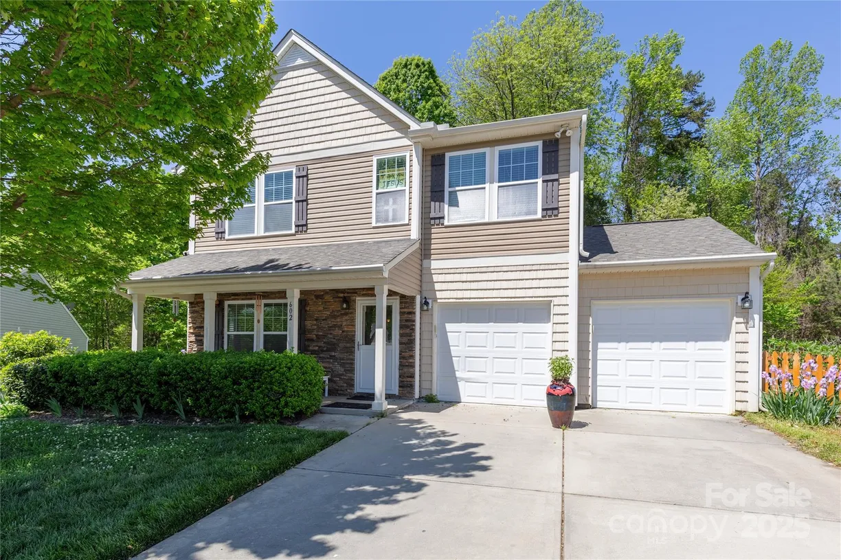 Charlotte Real Estate | View 602 Black Maple Drive | 4 Beds, 2 Baths