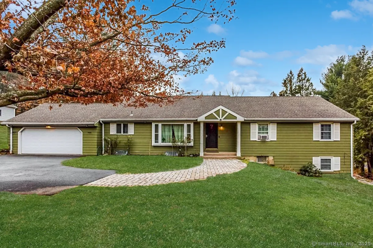 Greenwich Real Estate | View 599 Country Club Road | 4 Beds, 3 Baths