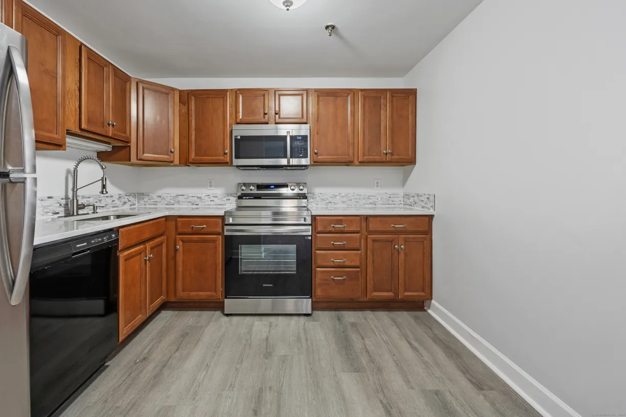 Greenwich Real Estate | View 95 Putter Drive, 418 | 2 Beds, 2 Baths