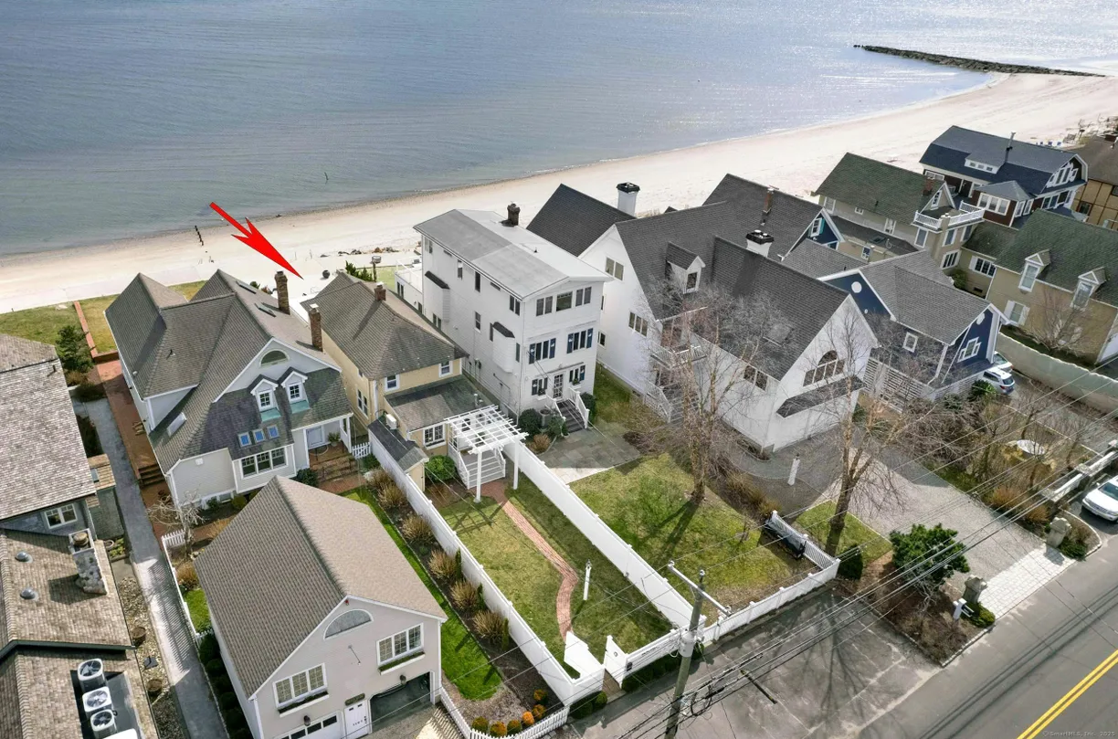 Greenwich Real Estate | View 1135 Fairfield Beach Road | 4 Beds, 2 Baths
