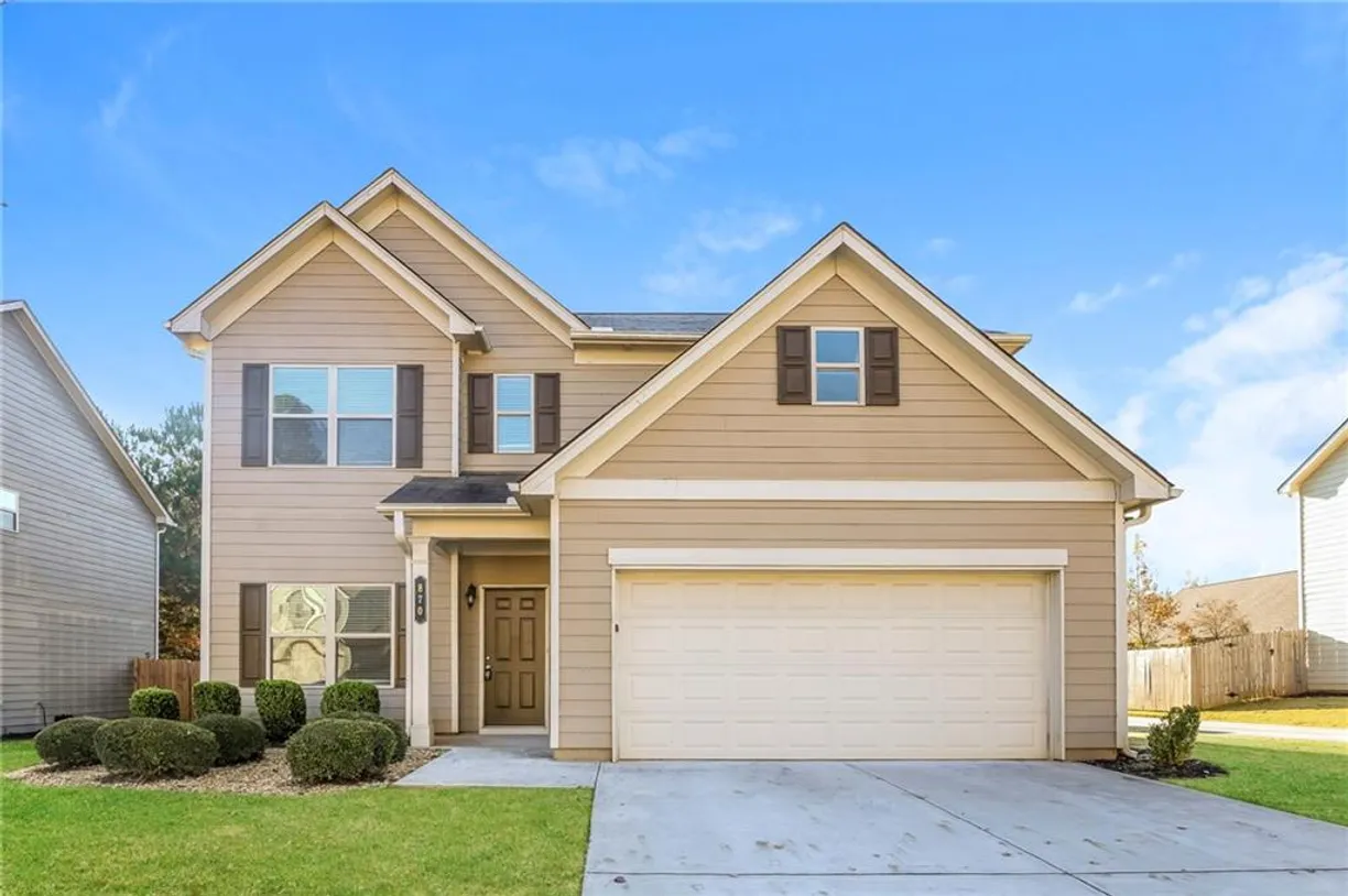 Savannah Real Estate | View 870 Walnut Woods Drive | 4 Beds, 2 Baths