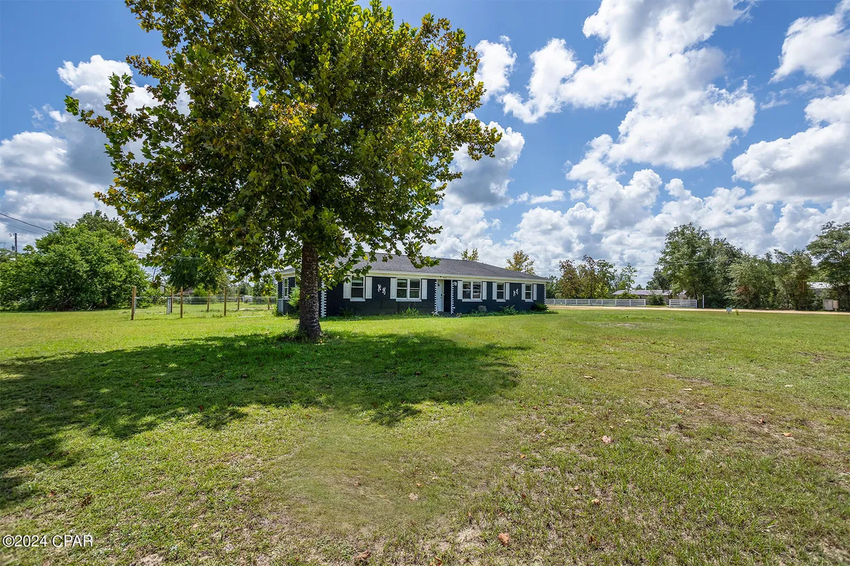 Northwest Florida Real Estate | View 8038 Willow Road | 4 Beds, 3 Baths