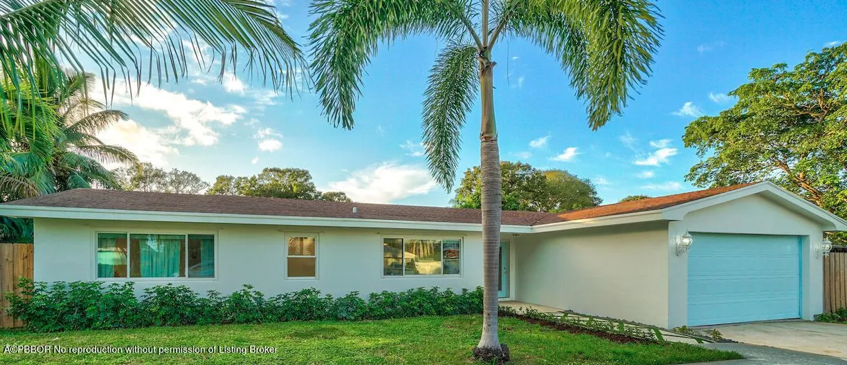 South Florida Real Estate | View 8045 W Lake Drive | 4 Beds, 3 Baths