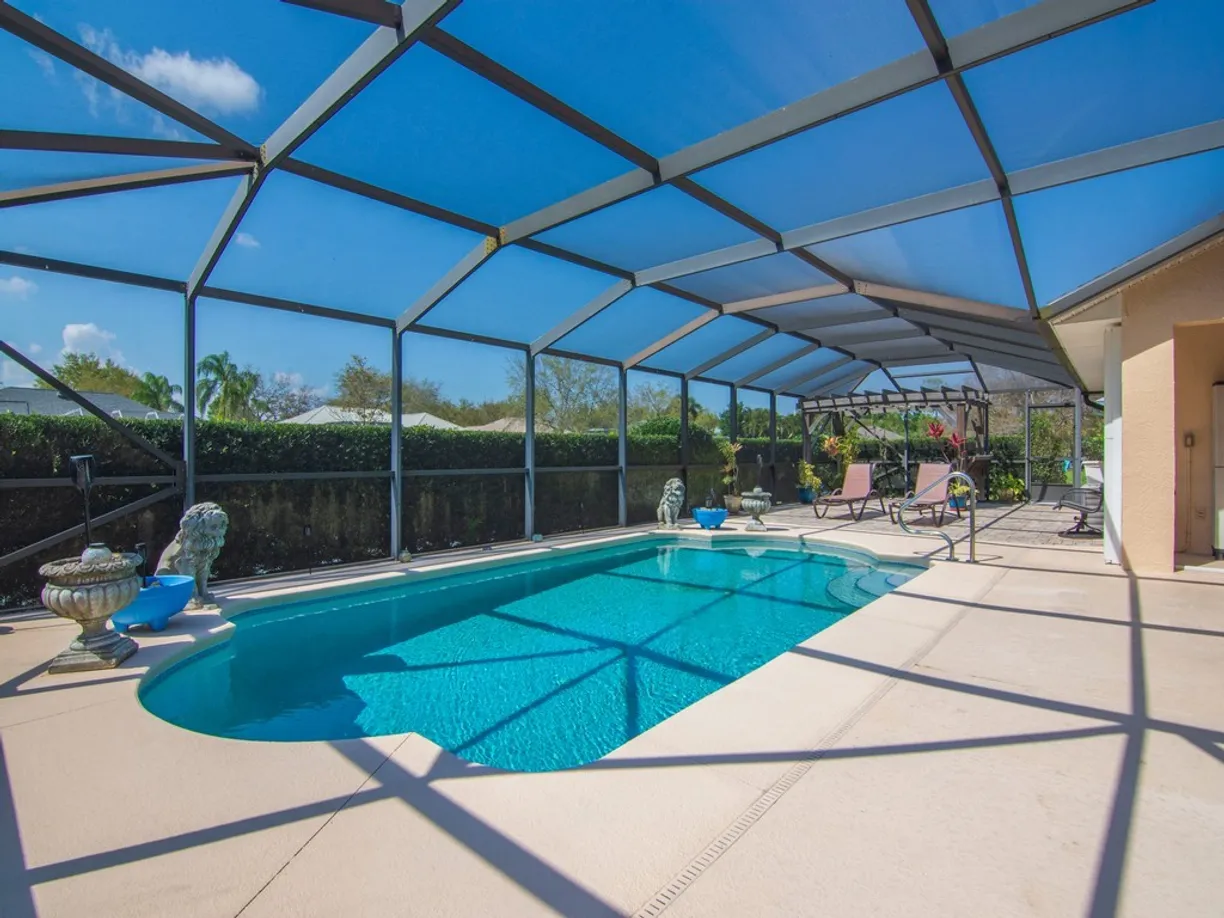 South Florida Real Estate | View 120 35th | 4 Beds, 2 Baths