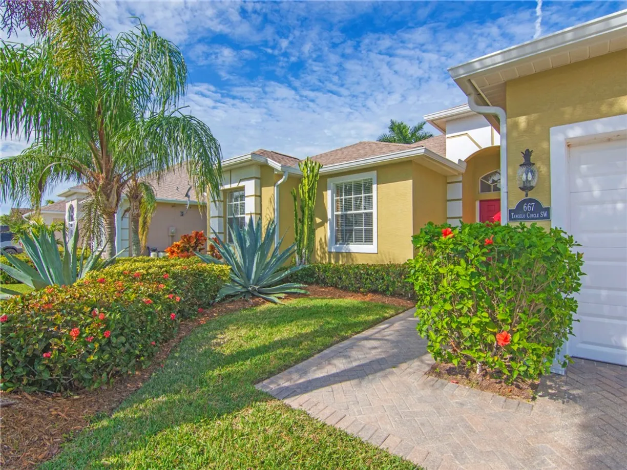 South Florida Real Estate | View 667 Tangelo | 4 Beds, 2 Baths