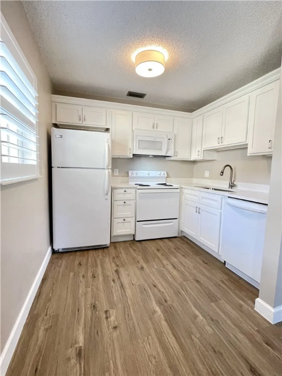 South Florida Real Estate | View 7 Vista Gardens, 102 | Listing