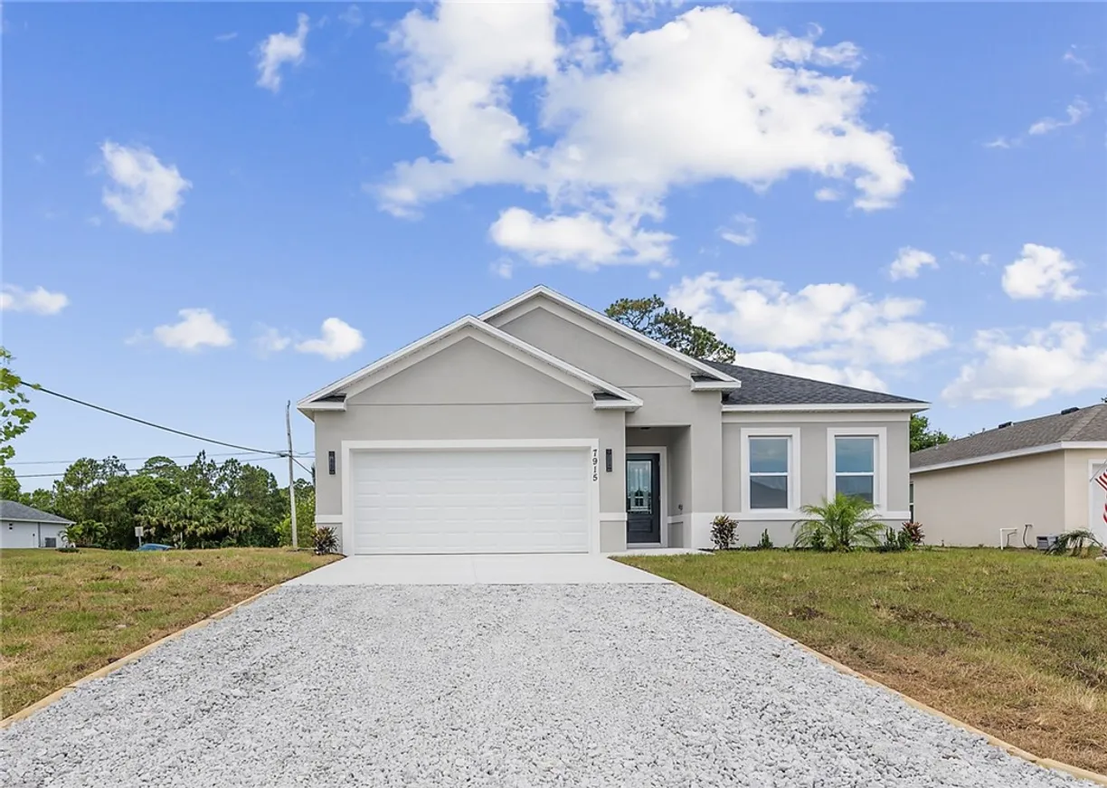 South Florida Real Estate | View 7915 100th | 4 Beds, 2 Baths