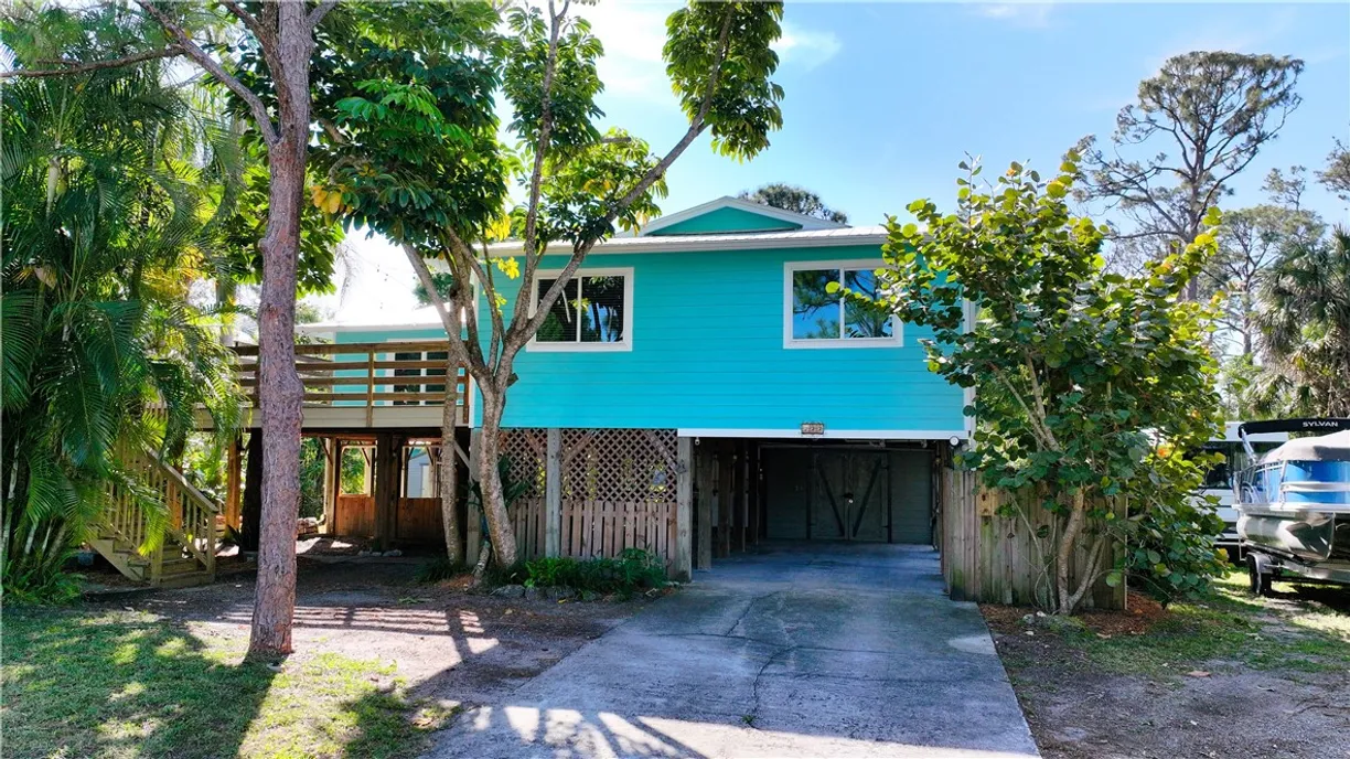 South Florida Real Estate | View 722 Surrey | 4 Beds, 2 Baths