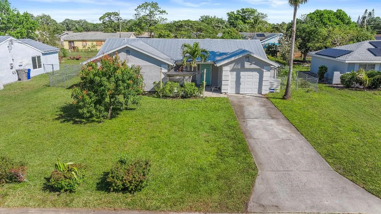 South Florida Real Estate | View 1056 24TH | 3 Beds, 2 Baths
