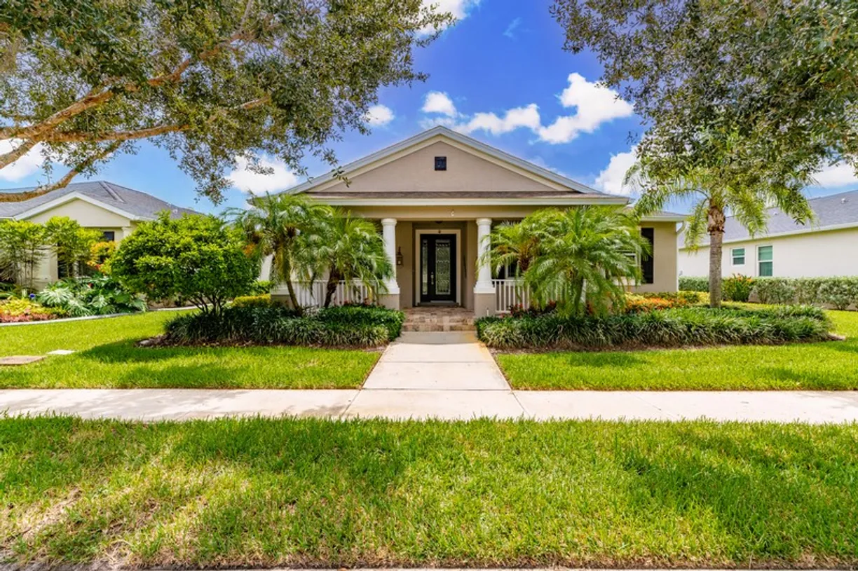 South Florida Real Estate | View 7298 E Village | 4 Beds, 2 Baths