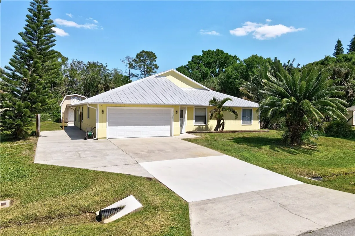 South Florida Real Estate | View 1568 Quatrain | 4 Beds, 2 Baths