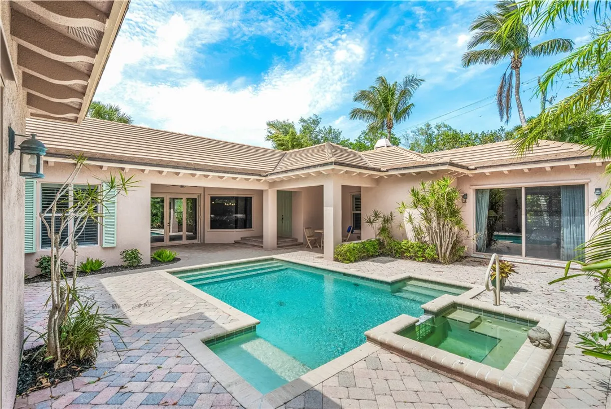 South Florida Real Estate | View 9038 Castle Harbour | 4 Beds, 3 Baths