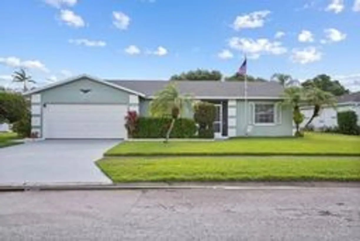 South Florida Real Estate | View 670 26th | 3 Beds, 2 Baths