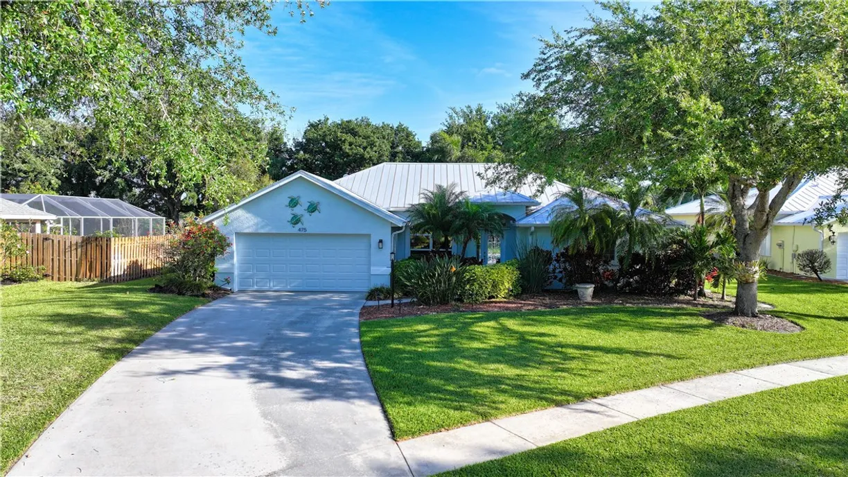 South Florida Real Estate | View 475 53rd | 3 Beds, 2 Baths