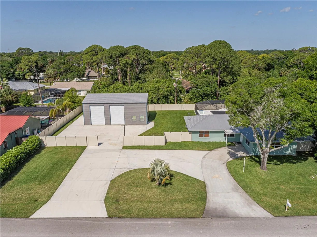 South Florida Real Estate | View 185 23rd | 4 Beds, 2 Baths