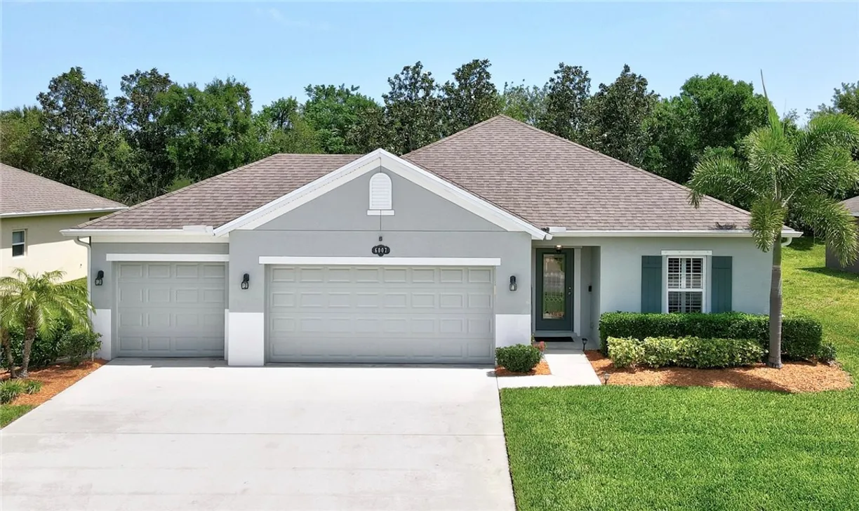 South Florida Real Estate | View 6007 Ridge Lake | 4 Beds, 2 Baths