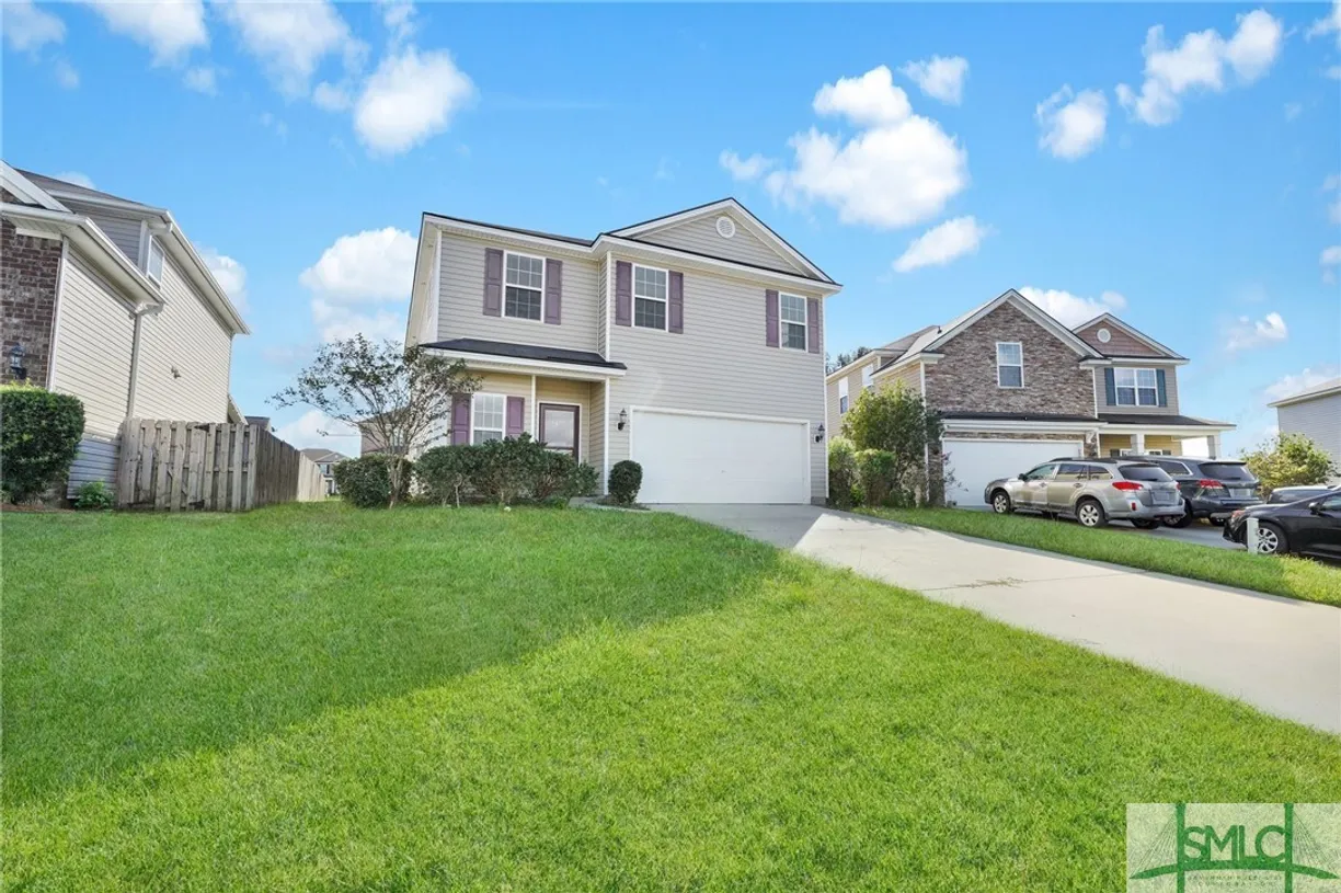 Savannah Real Estate | View 210 Calm Oak Circle | 4 Beds, 2 Baths