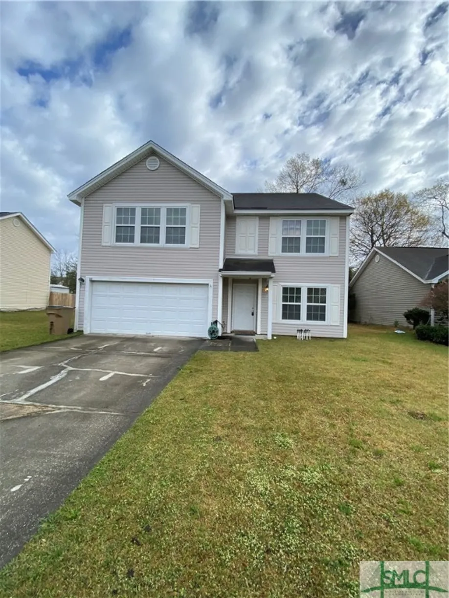 Savannah Real Estate | View 24 Willow Lakes Drive | 4 Beds, 2 Baths