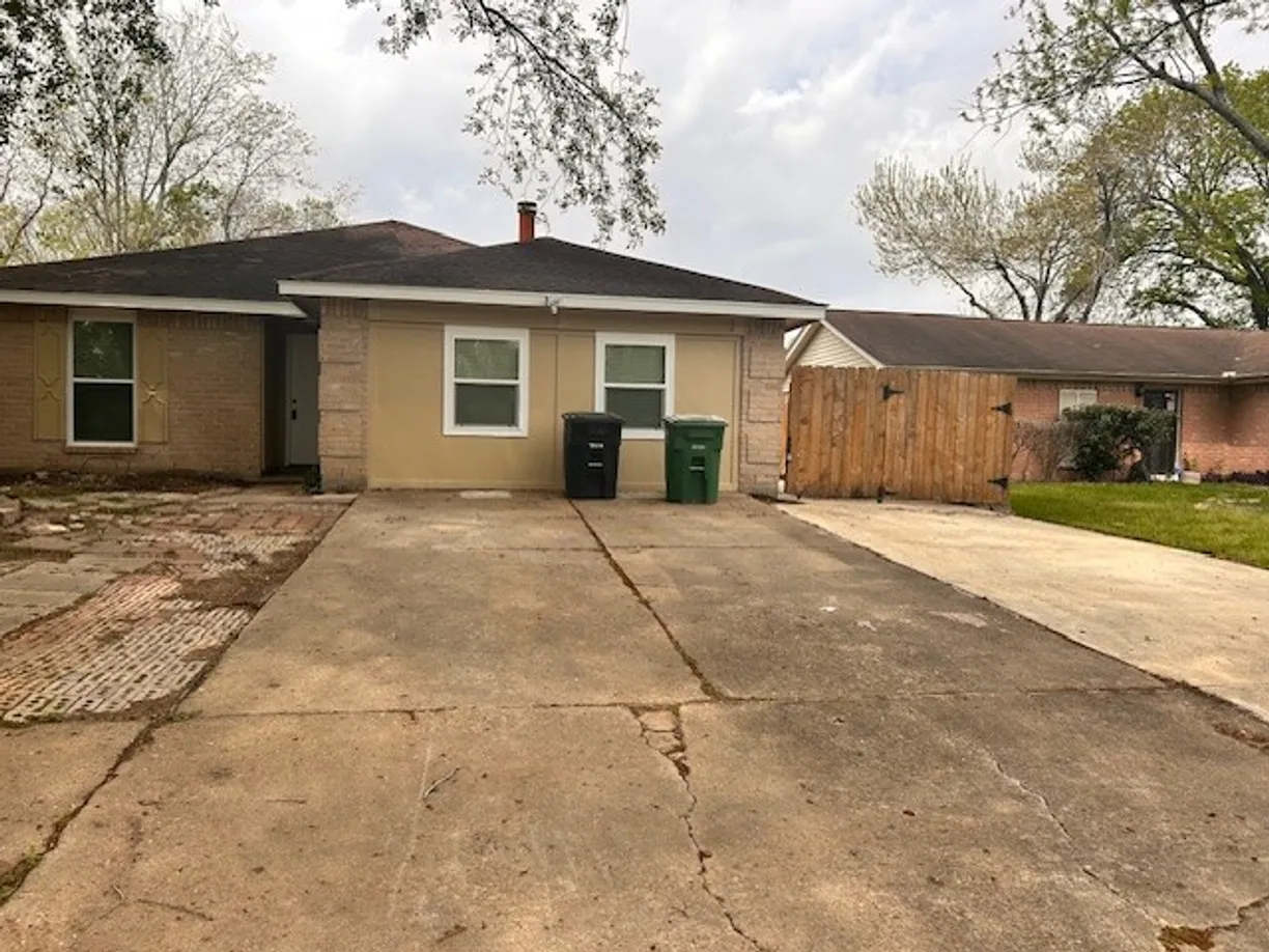 Houston Suburbs Real Estate | View 15834 Bazelbriar Lane | 4 Beds, 2 Baths