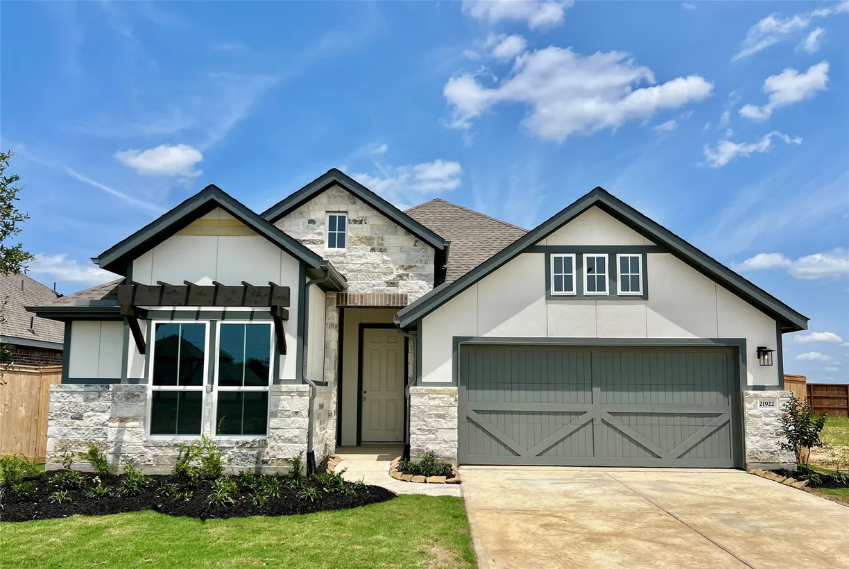 Houston Suburbs Real Estate | View 21922 Laurel Cherry Court | 3 Beds, 2 Baths