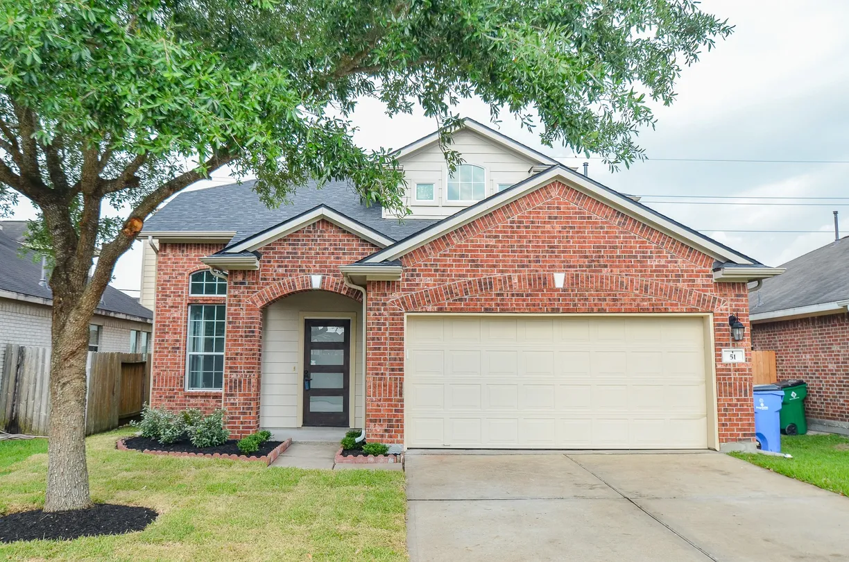 Houston Real Estate | View 51 Garden Grove Drive | 4 Beds, 2 Baths