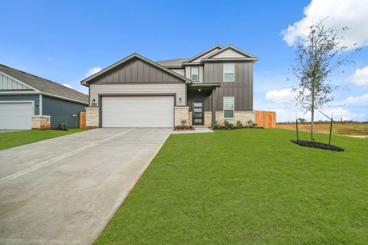 Houston Suburbs Real Estate | View 30243 Fledged Wing Drive | 4 Beds, 2 Baths