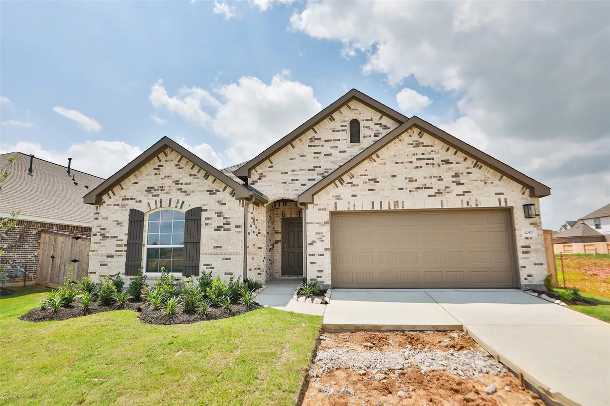 Houston Suburbs Real Estate | View 32411 Cedar Elm Drive | 5 Beds, 3 Baths