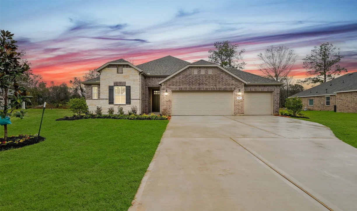 Houston Suburbs Real Estate | View 990 Tarkington Timbers Drive | 3 Beds, 2 Baths