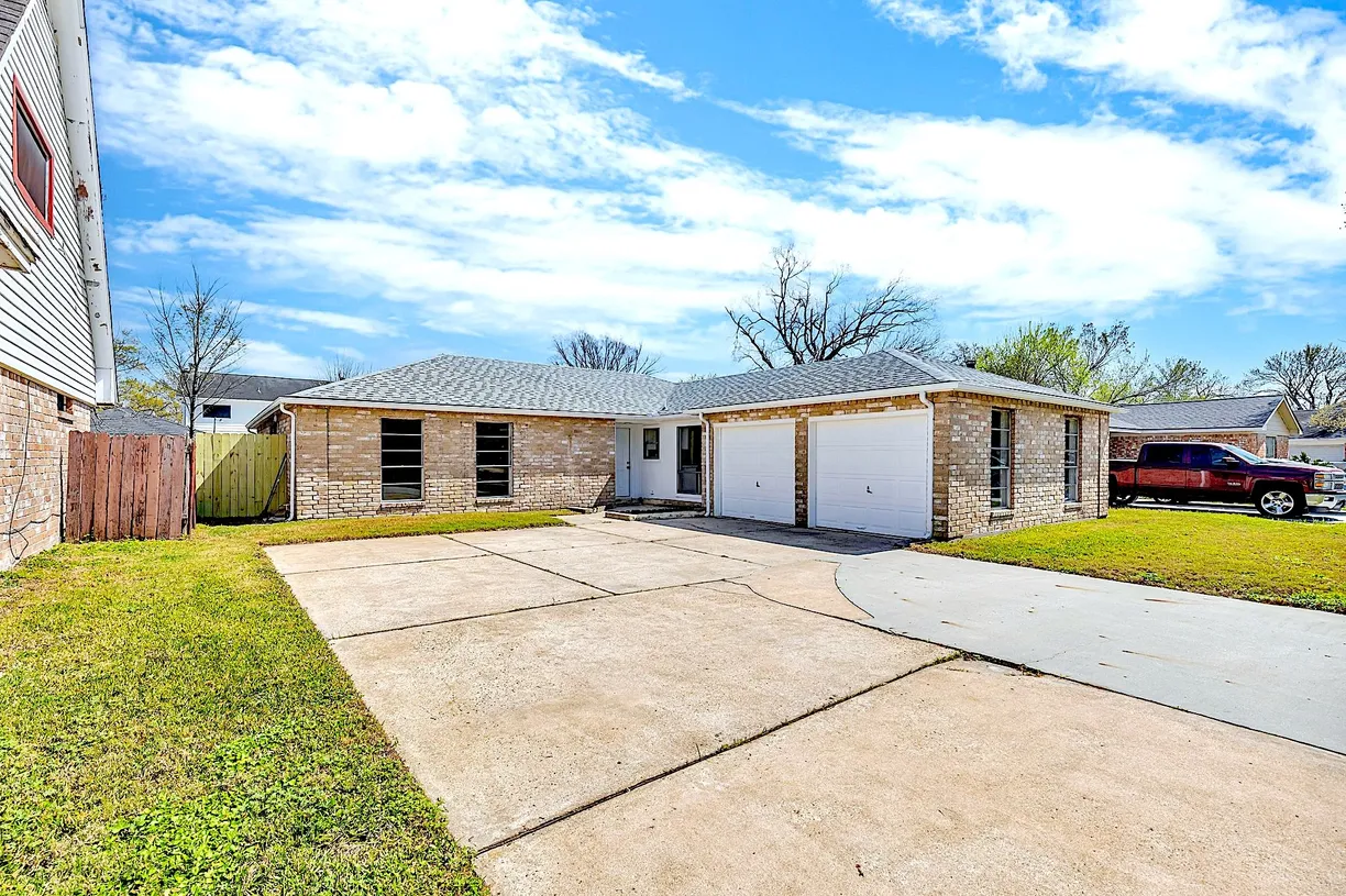 Houston Real Estate | View 231 Andorra Lane | 4 Beds, 2 Baths