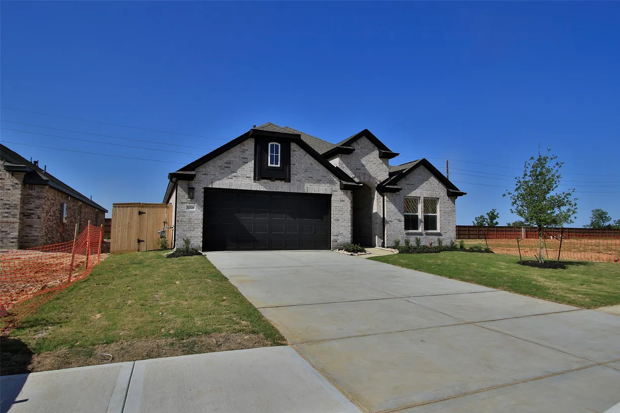 Houston Suburbs Real Estate | View 32326 Green Ash Drive | 4 Beds, 3 Baths