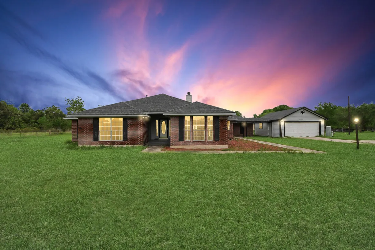 Houston Suburbs Real Estate | View 2443 Illinois Street | 4 Beds, 2 Baths