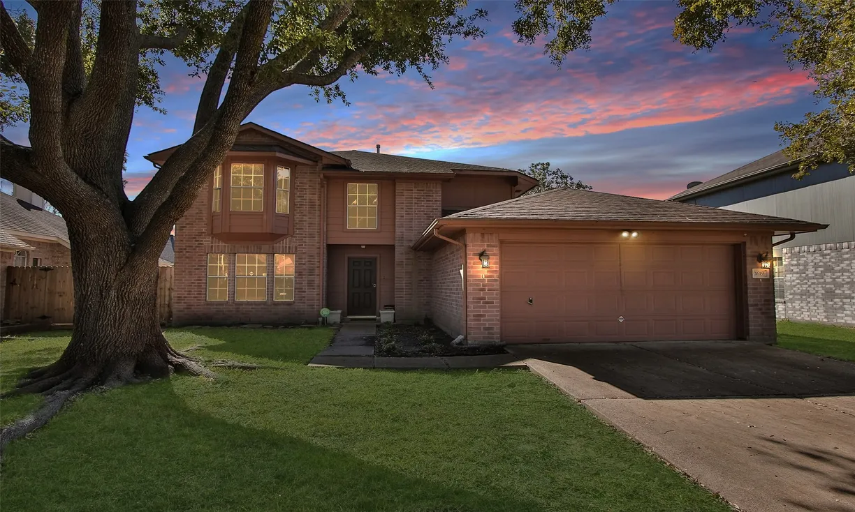 Houston Suburbs Real Estate | View 1619 Regal Blue Court | 4 Beds, 2 Baths