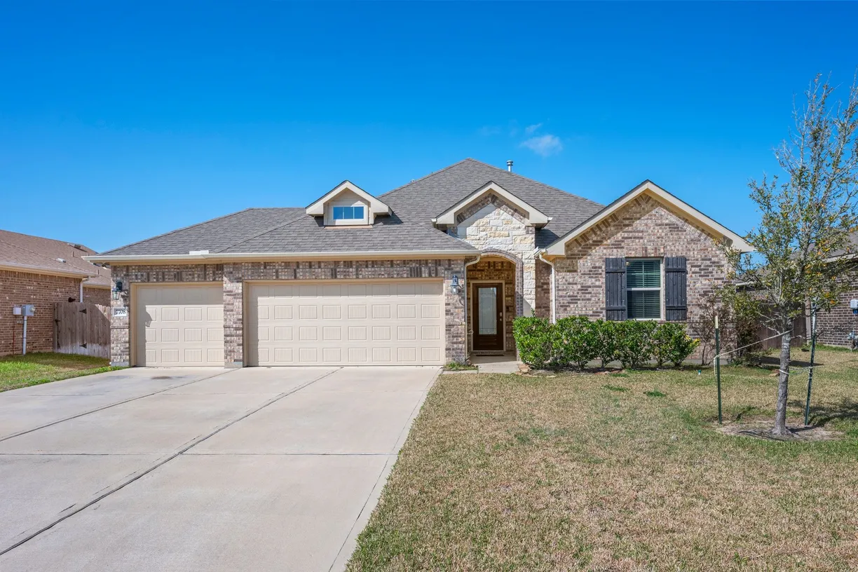 Houston Suburbs Real Estate | View 7708 Bogie Lane | 4 Beds, 2 Baths