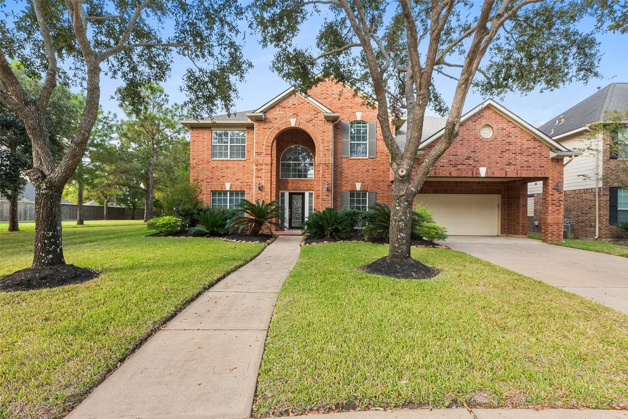 Houston Real Estate | View 4619 Huntwood Hills Lane | 5 Beds, 3 Baths