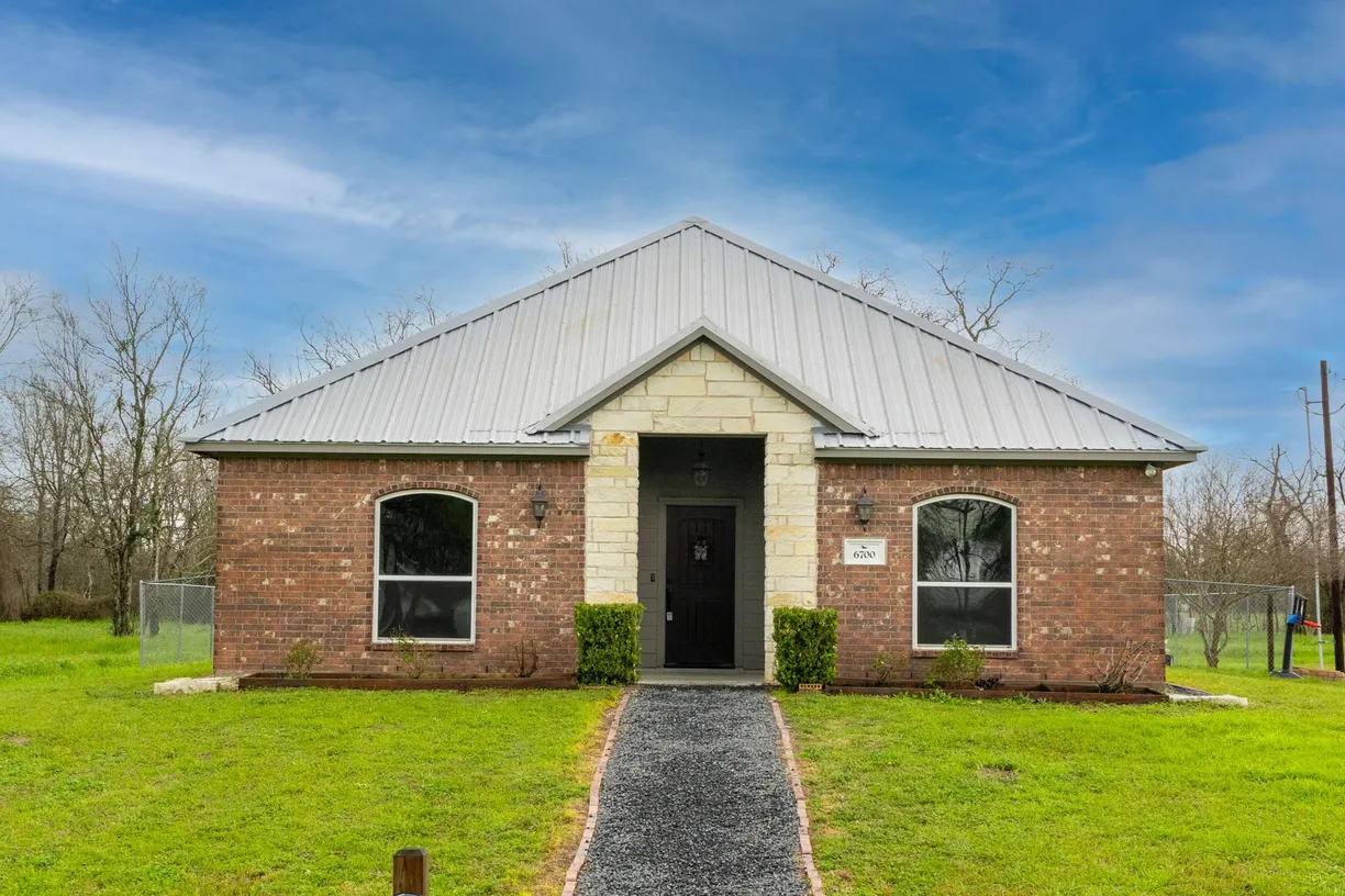 Houston Suburbs Real Estate | View 6700 Church Street | 3 Beds, 2 Baths