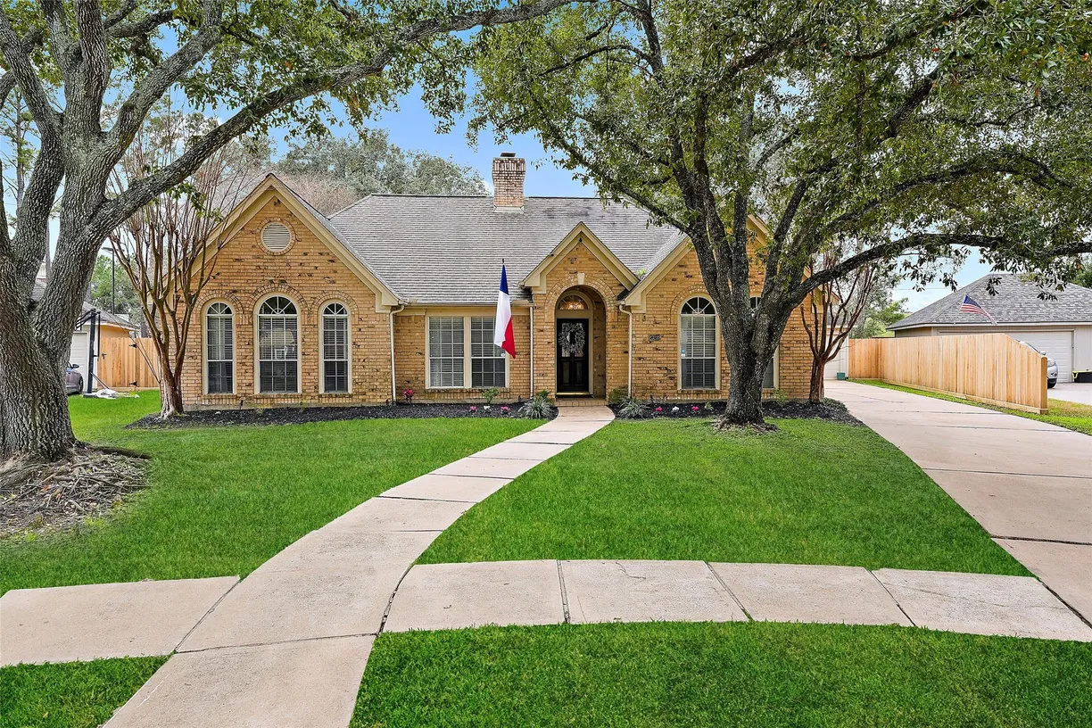 Houston Real Estate | View 23219 Lodgepoint Drive | 4 Beds, 2 Baths
