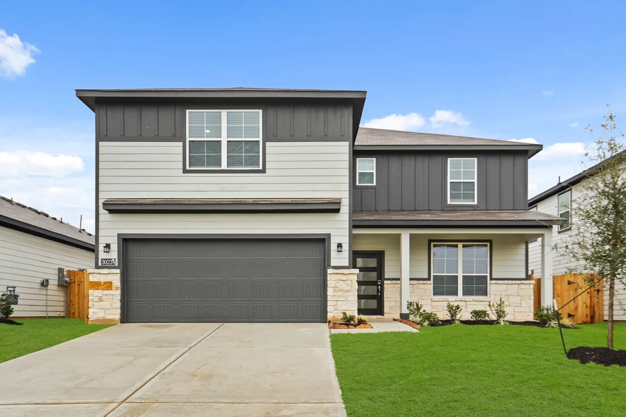 Houston Suburbs Real Estate | View 30234 Fledged Wing Drive | 5 Beds, 3 Baths