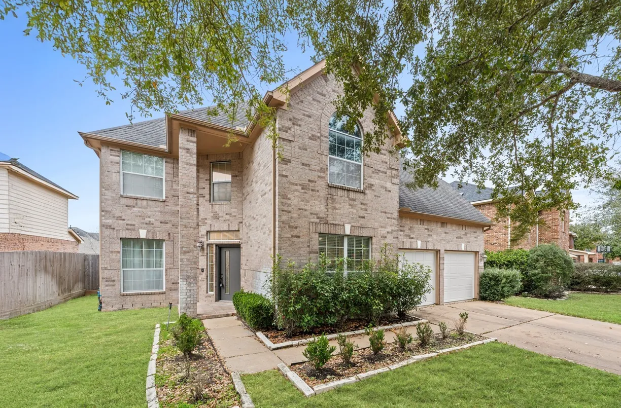 Houston Real Estate | View 7410 Saxon Hill Lane | 4 Beds, 2 Baths