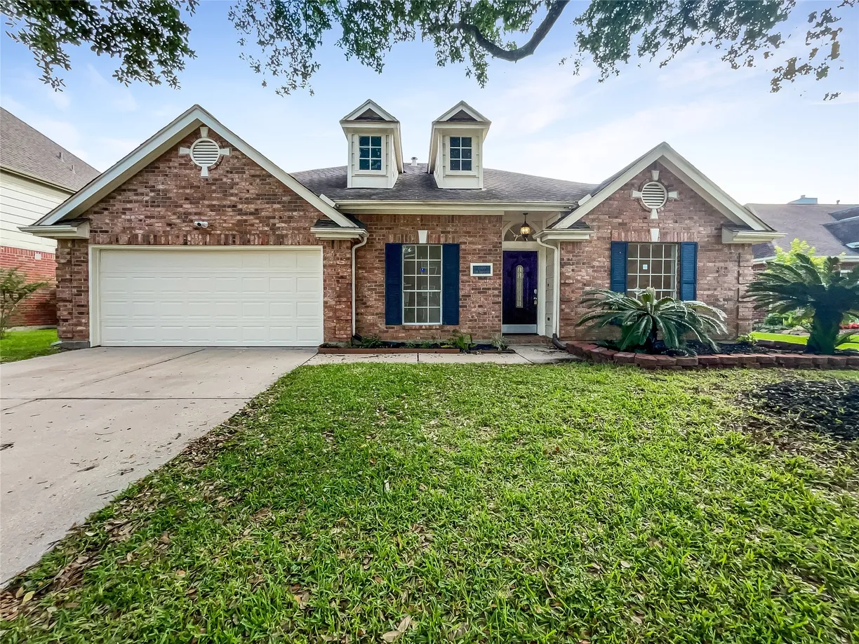Houston Real Estate | View 1809 Oak Cluster Circle | 4 Beds, 2 Baths