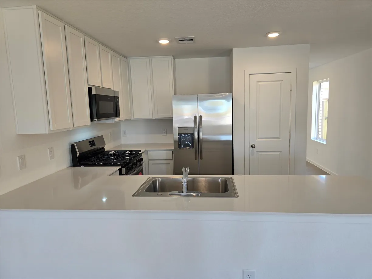Houston Real Estate | View 5911 Standpiper Loop | 4 Beds, 2 Baths