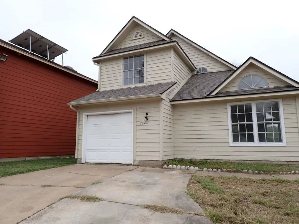 Houston Suburbs Real Estate | View 7644 Goudin Drive | 4 Beds, 2 Baths